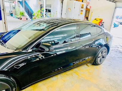 Negocio Hector's Tint & Alarms